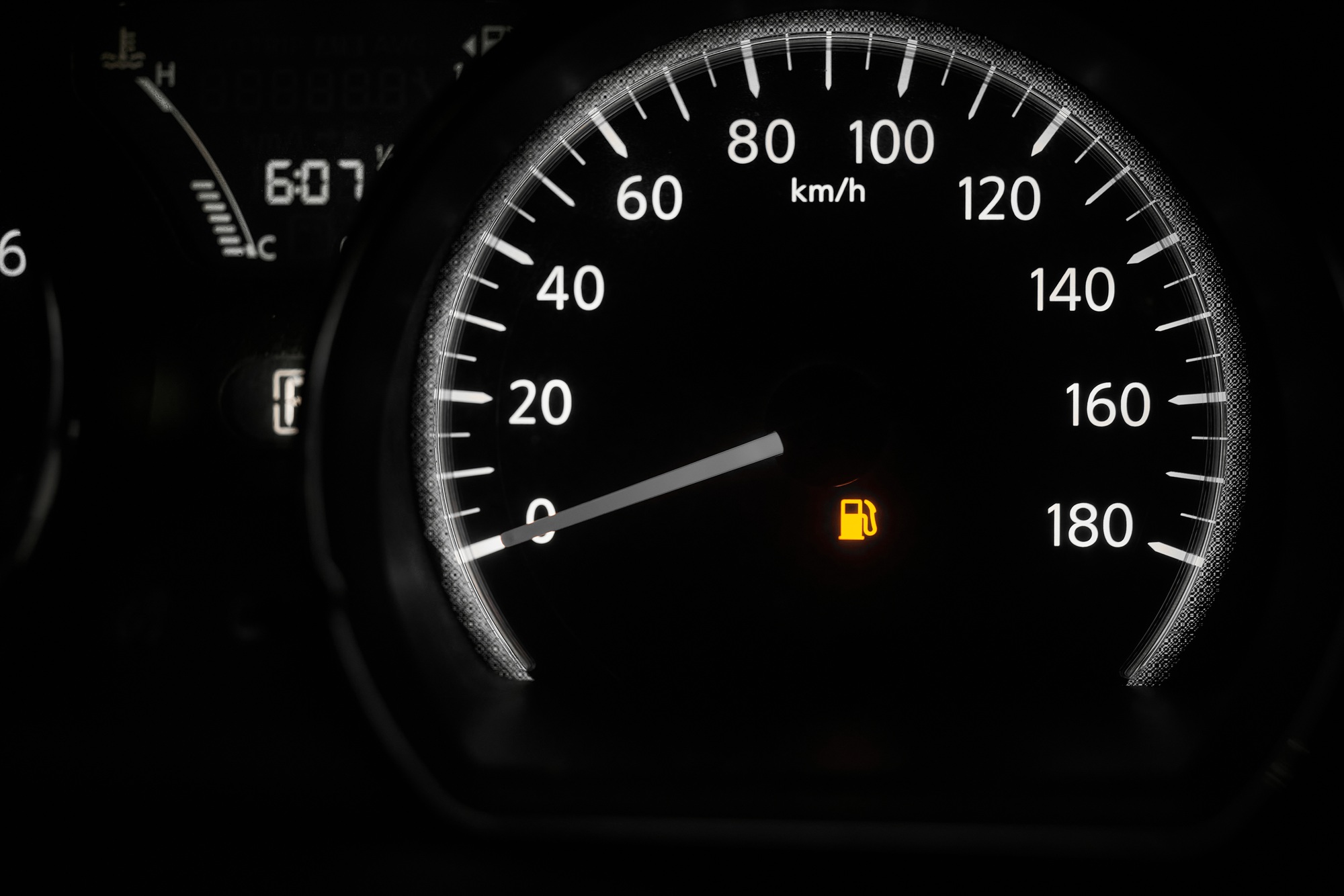 The car dashboard with a speedometer
