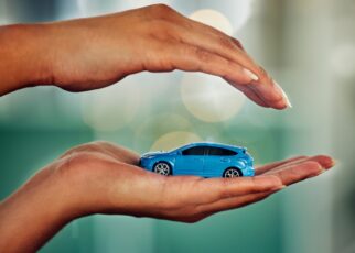 Car, insurance and hands for transport mockup, investment or loan with bokeh background. Invest, tr